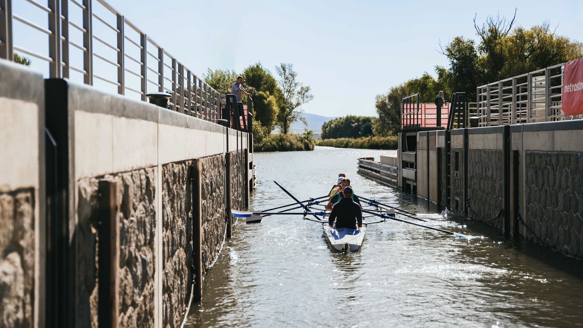 Rowing crew entering the lock chamber